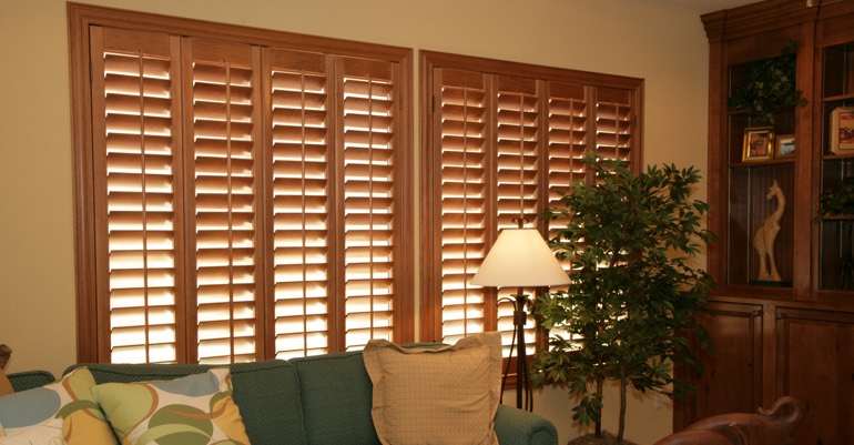 Natural wood shutters in Jacksonville living room.